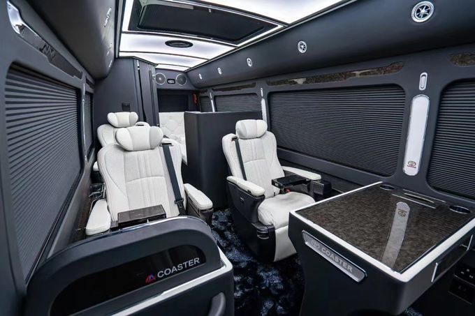 Toyota Coaster 7 chỗ xe buýt du lịch xăng lái sau 4 × 2 hộp số thủ công 5